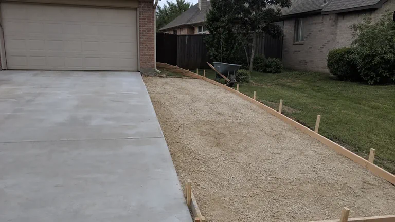 Concrete base preparation for driveway widening in North Texas